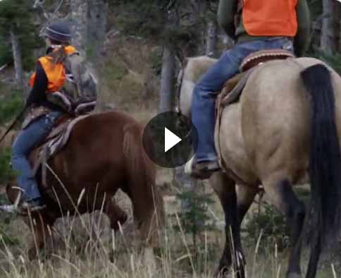 video screenshot of people riding horseback
